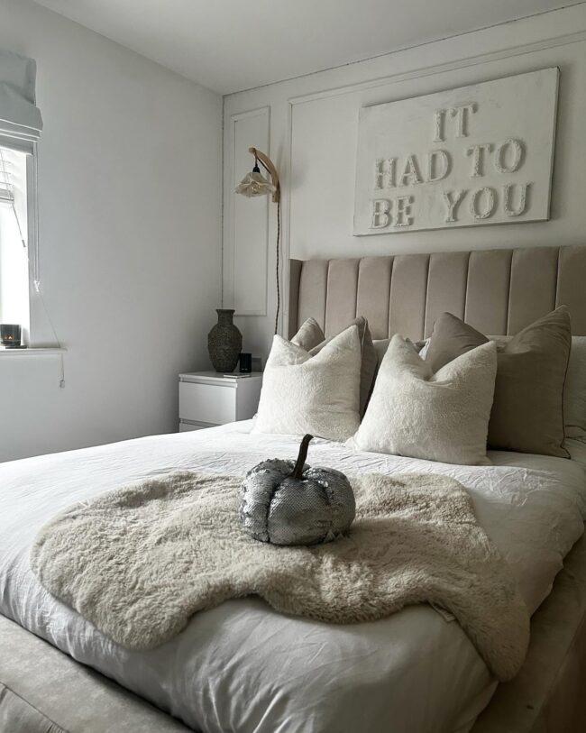 Cozy Bedroom with Metallic Pumpkin Accent