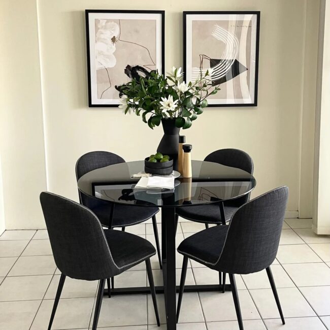 Chic Black Glass Dining Table Setup