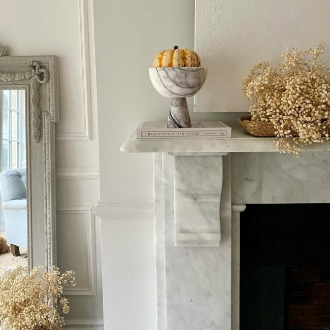 Elegant Marble Mantel with Autumn Accents