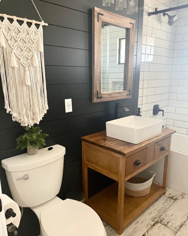 Dark Shiplap Walls with Warm Wooden Vanity Details