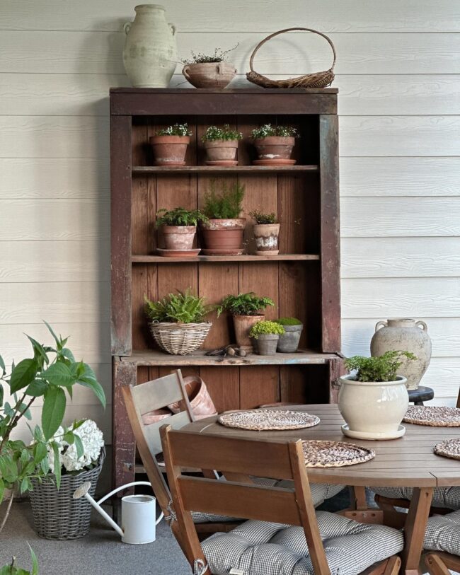 Rustic Patio Featuring Potted Greenery