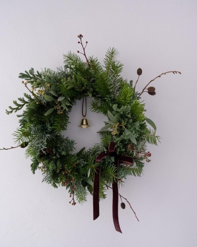 A Timeless Green Wreath with Elegant Touches