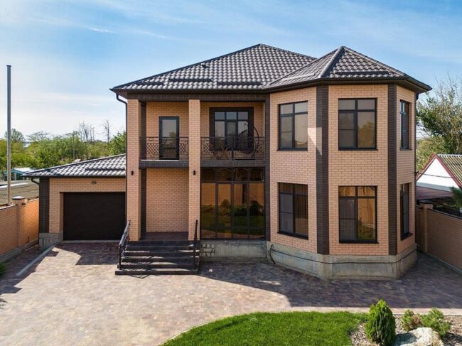 Classic Brick Facade with Black-Framed Windows