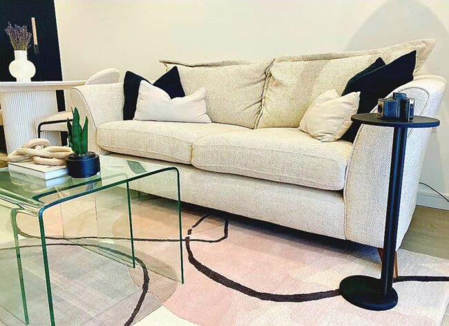 Modern Glass Side Table with Neutral Couch