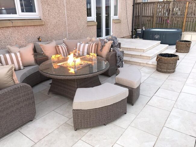 Cozy Fire Pit Surrounded by Cushioned Seating