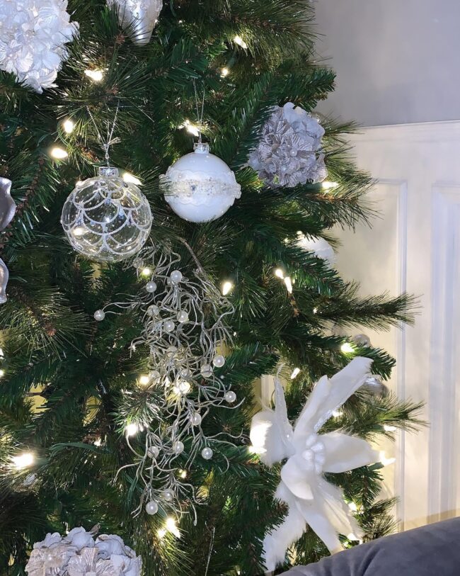 A Tree Covered in Frosty Holiday Magic